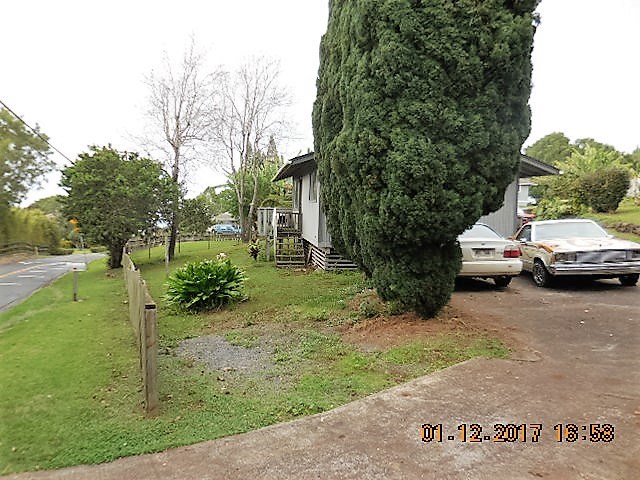 441 Copp Road Kula, HI 96790 - Photo 14 of 21 a view of a house with a yard