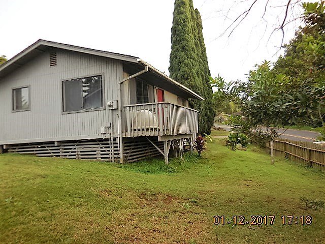441 Copp Road Kula, HI 96790 - Photo 17 of 21 a backyard of a house with table and chairs