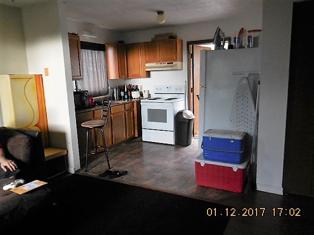 441 Copp Road Kula, HI 96790 - Photo 20 of 21 a kitchen with a refrigerator stove and sink