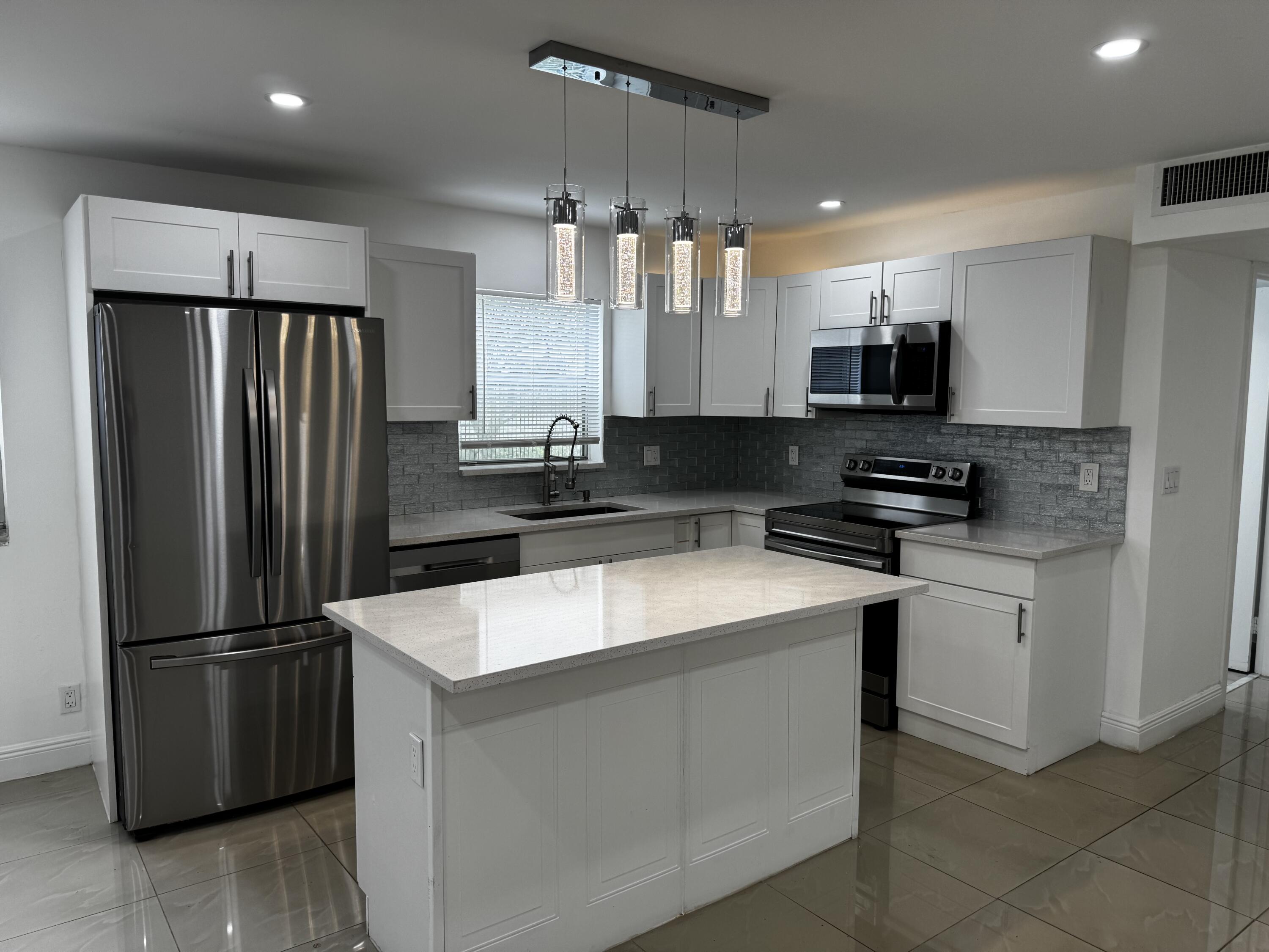 153 Monaco Way, Unit D Delray Beach, FL 33446 - Photo 1 of 20 IMG_2026