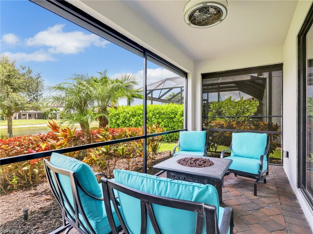 4383 Bismark Way Naples, FL 34119 - Photo 13 of 49 Screened In Lanai with Lake View, Paver Patio, AHT Electric Screen on Back Screen, Roll Down Screen on Side Screen, & Upgraded Landscaping