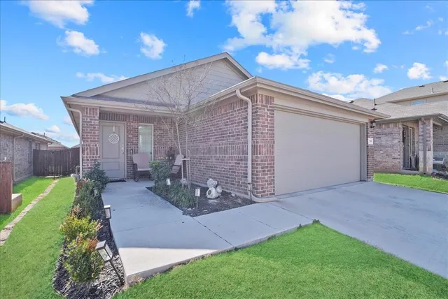 a view of a back yard of the house