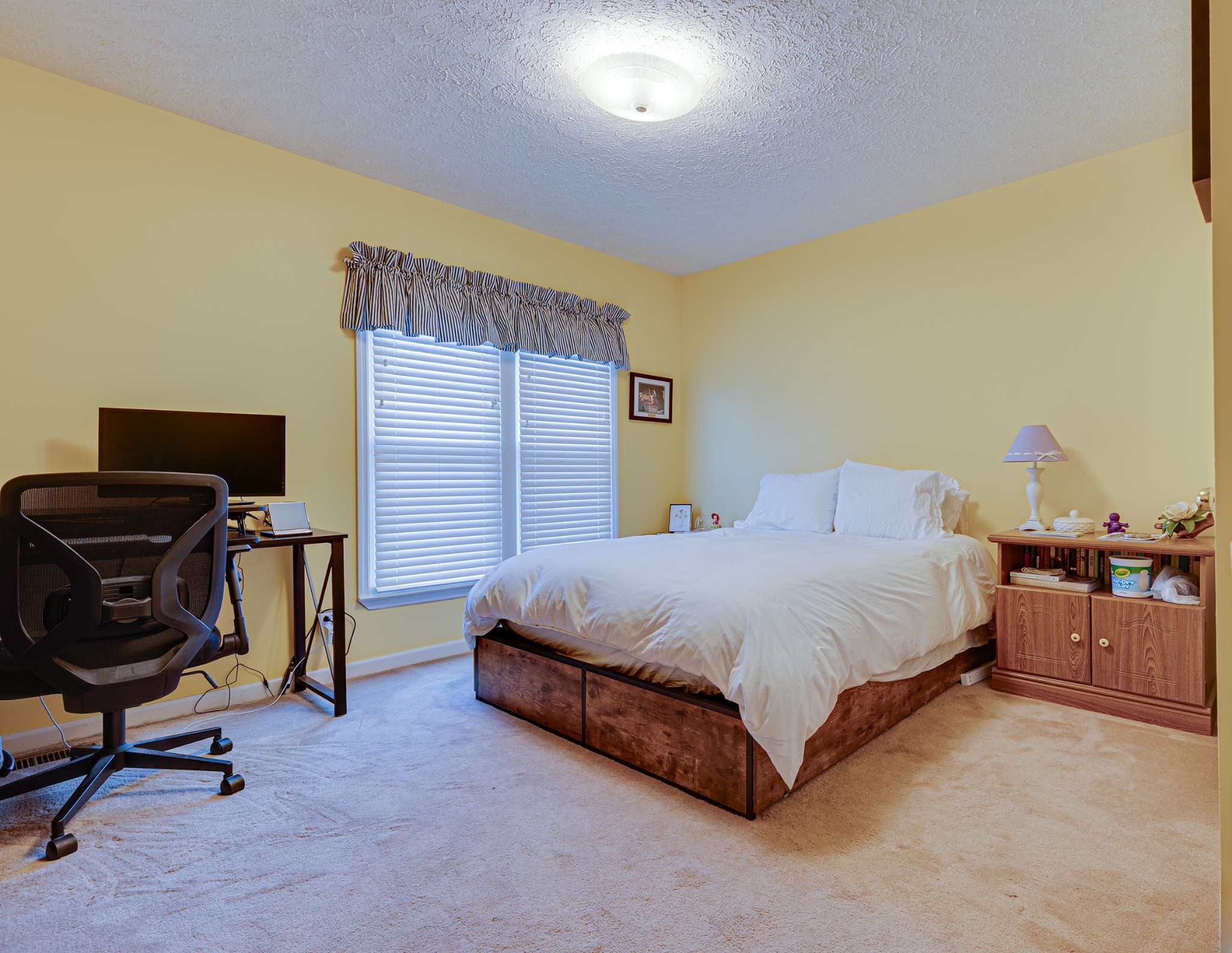 206 West Marthona Road Madison, TN 37115 - Photo 9 of 16 a bedroom with a bed and chair