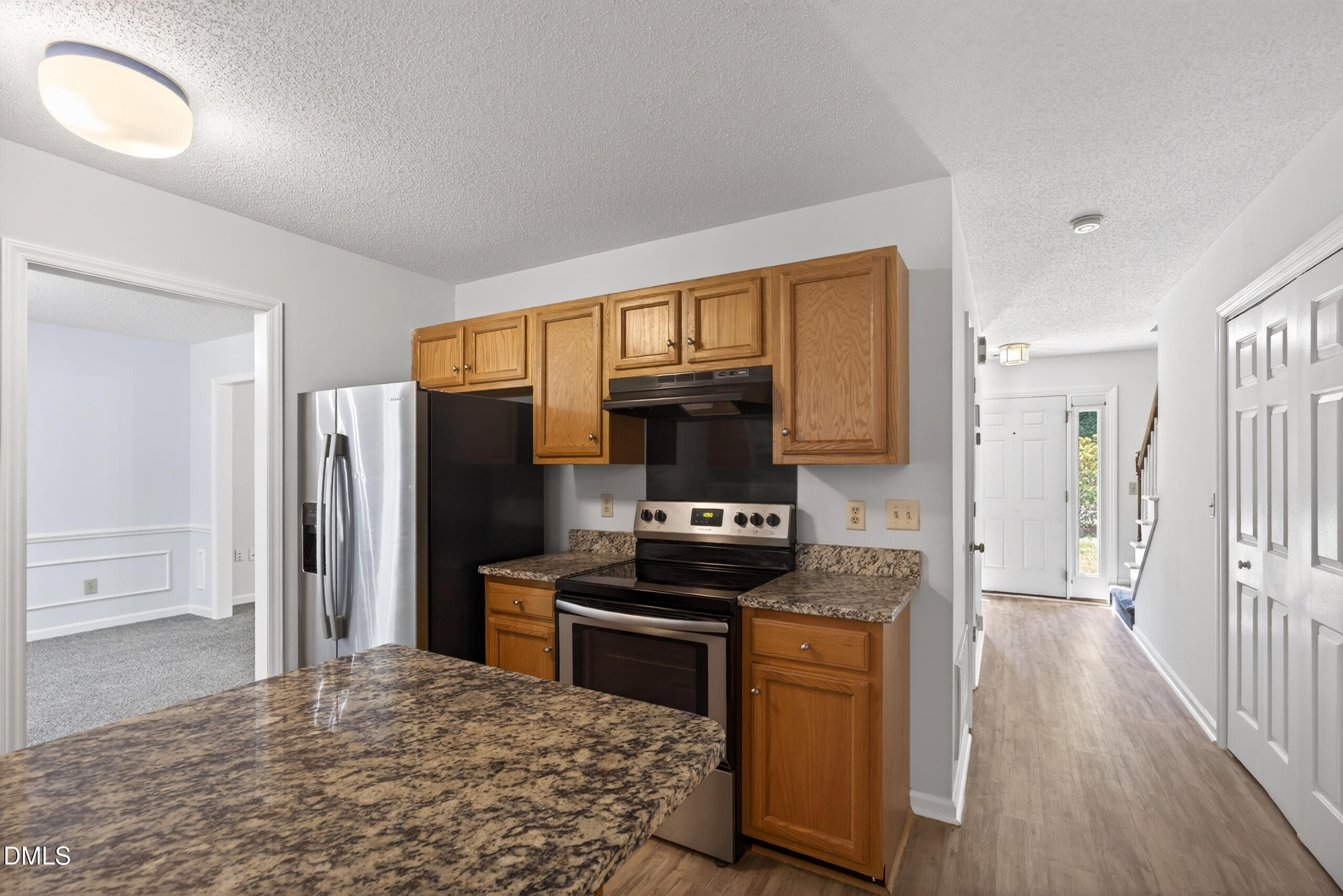 1901 Whites Mill Road High Point, NC 27265 - Photo 8 of 24 a kitchen with stainless steel appliances a refrigerator stove and sink