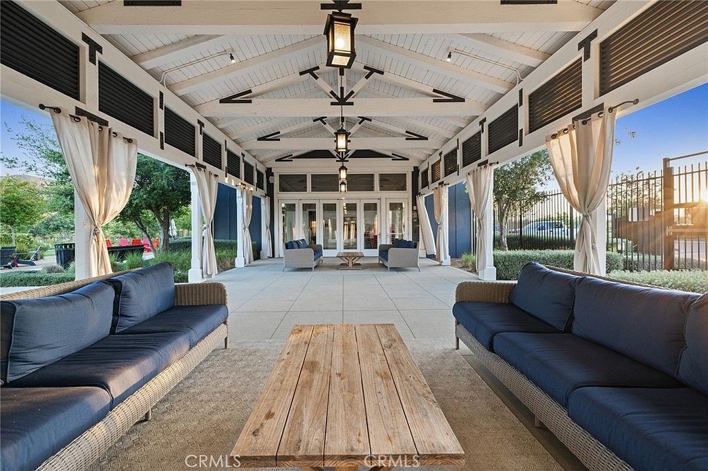 29901 Bridlegate Way Menifee, CA 92584 - Photo 41 of 43 a view of a living room and a patio