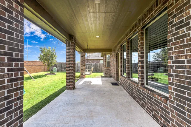 a view of swimming pool with a porch