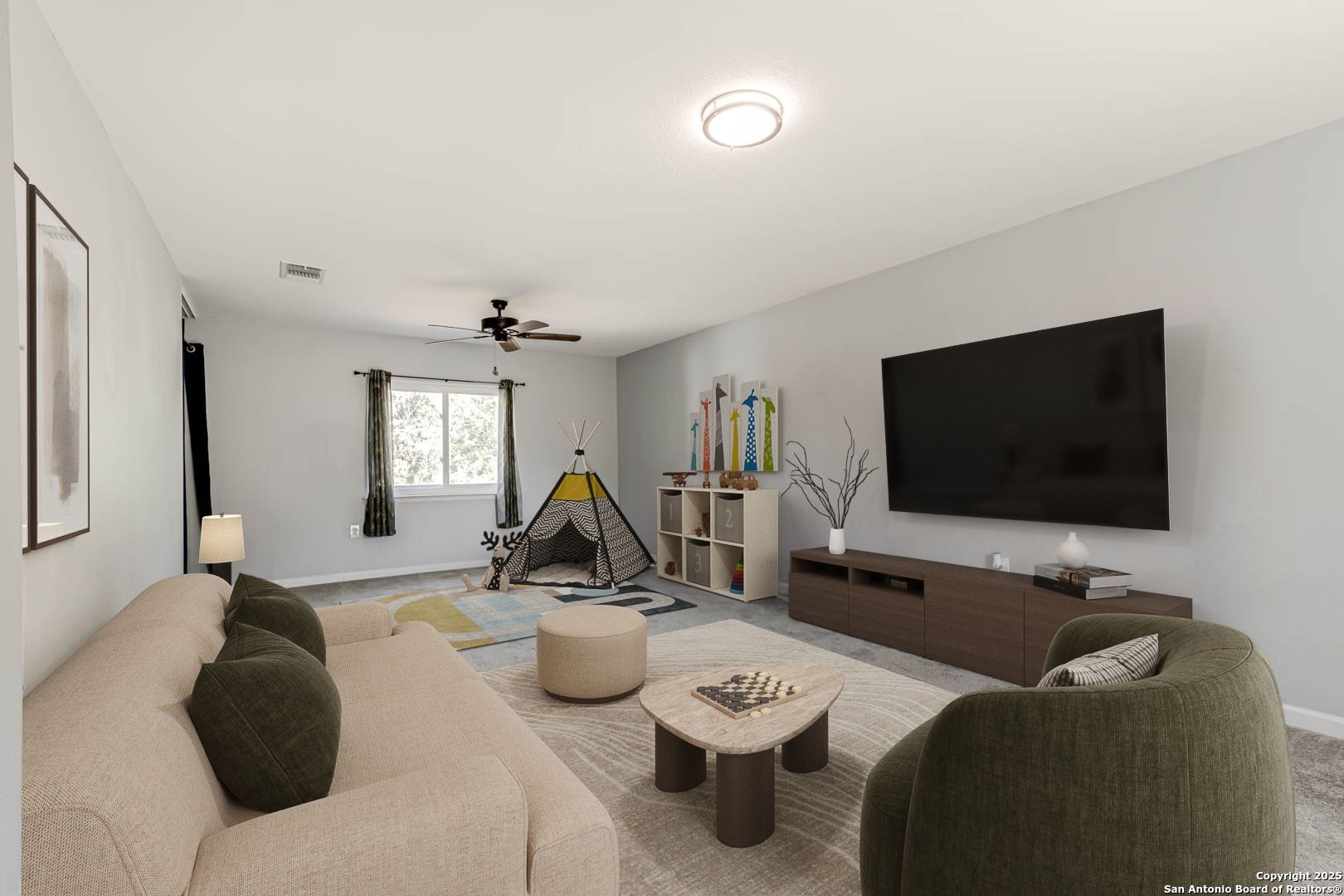 6719 Timberhill Leon Valley, TX 78238 - Photo 12 of 20 a living room with furniture and a flat screen tv