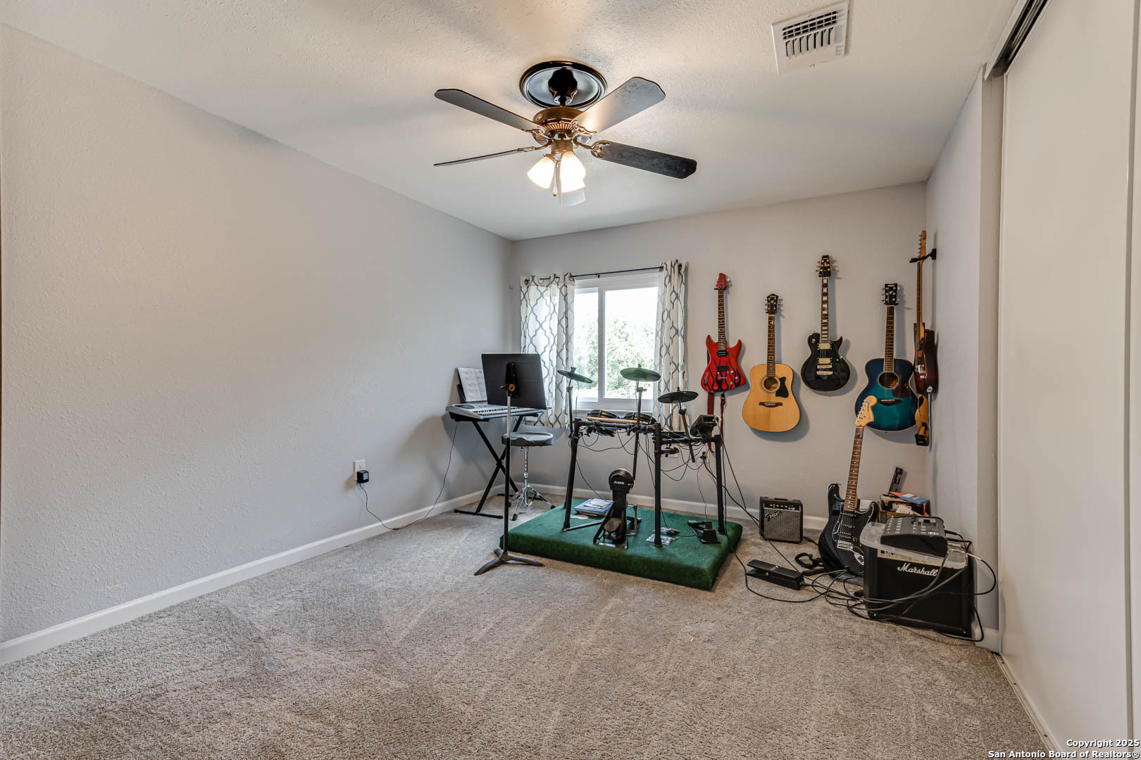 6719 Timberhill Leon Valley, TX 78238 - Photo 14 of 20 a view of a room with gym equipment