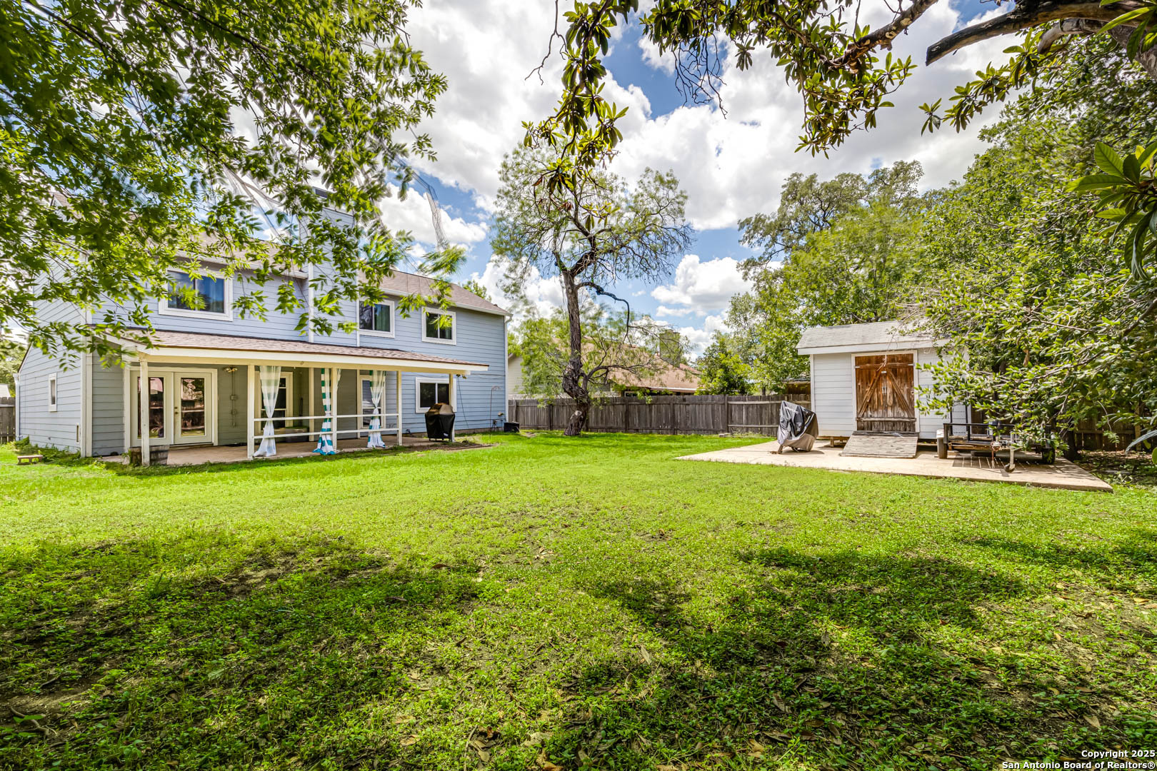 6719 Timberhill Leon Valley, TX 78238 - Photo 20 of 20 a front view of house with yard and seating area