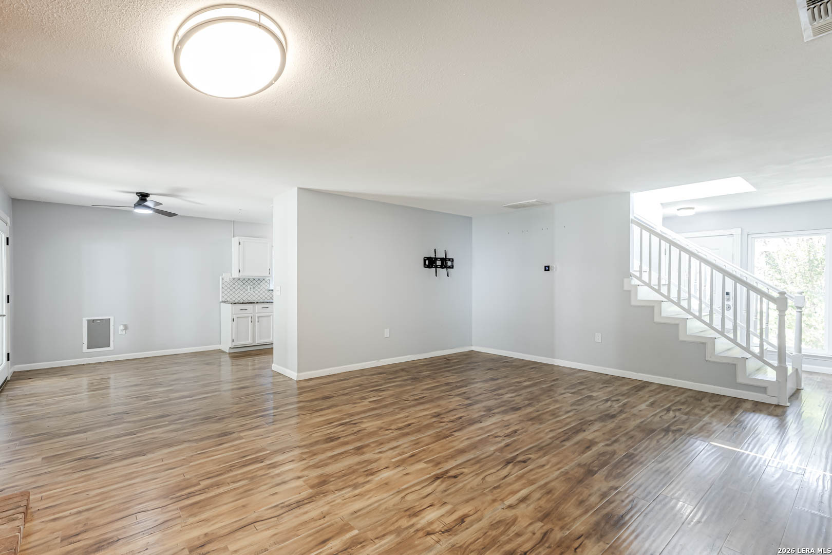 6719 Timberhill Leon Valley, TX 78238 - Photo 4 of 20 a view of empty room with wooden floor