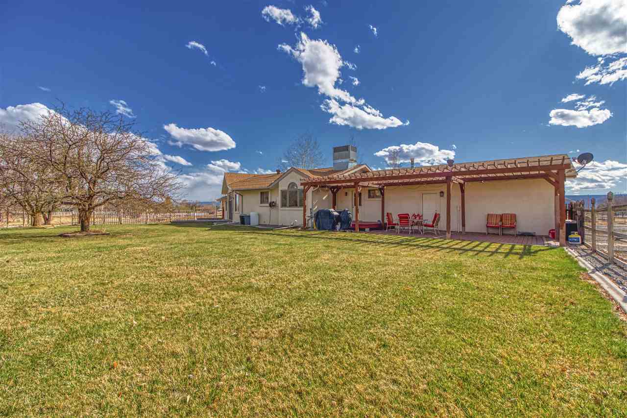 1130 23 Road Grand Junction, CO 81505 - Photo 27 of 30 a view of a house with a big yard