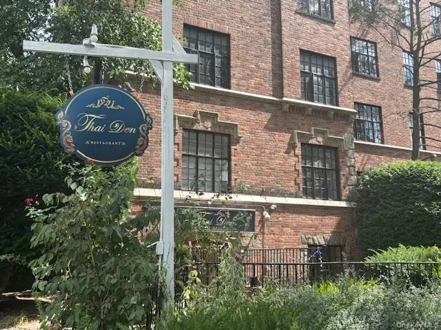 a sign that is on the side of a building