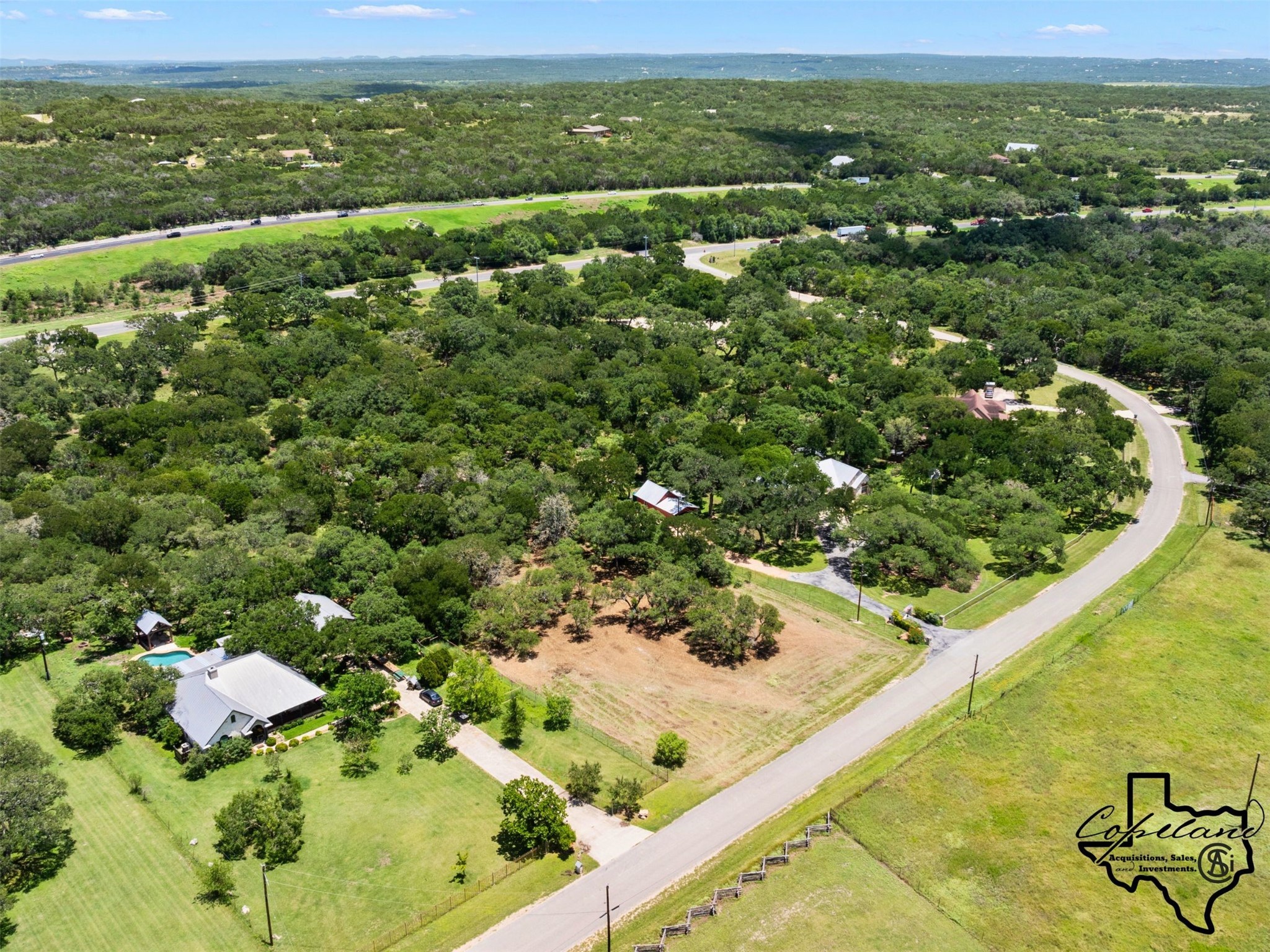 386 Landons Way Spring Branch, TX 78070 - Photo 4 of 10 a view of a lake with a mountain