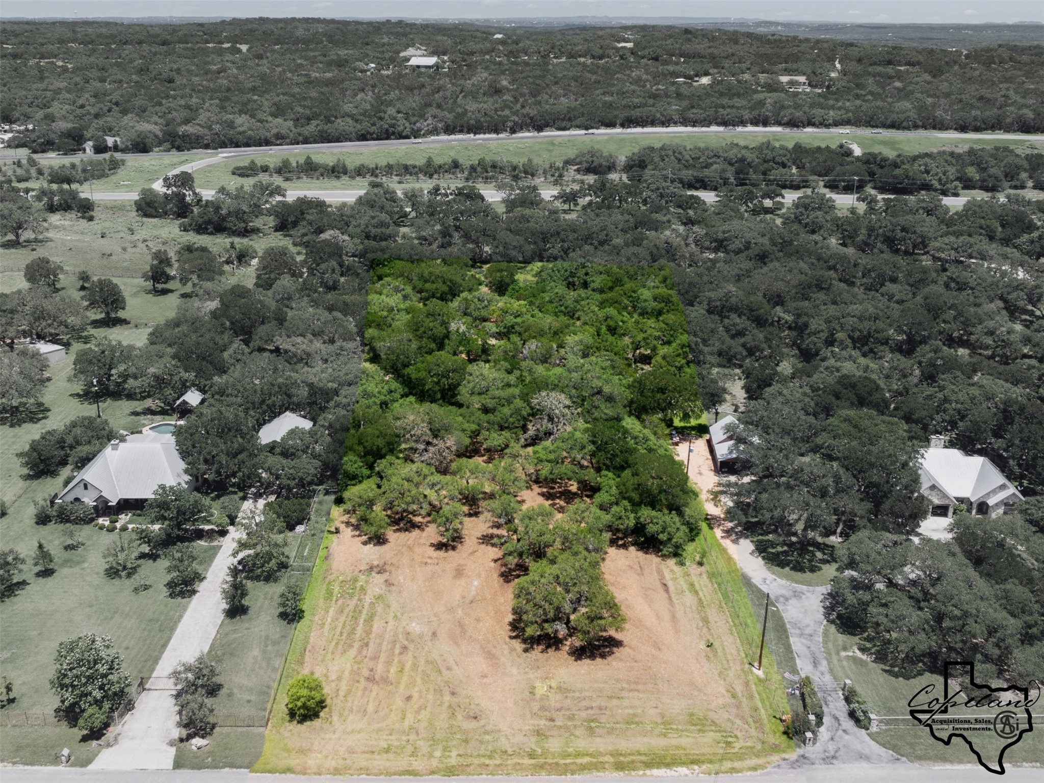 386 Landons Way Spring Branch, TX 78070 - Photo 10 of 10 an aerial view of a houses with a yard