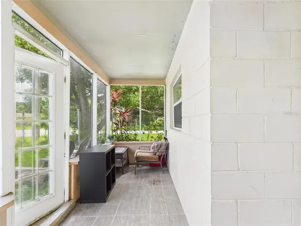 a view of a room with a large window