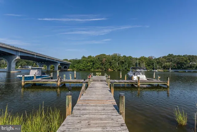 a view of house with pool and outdoor space