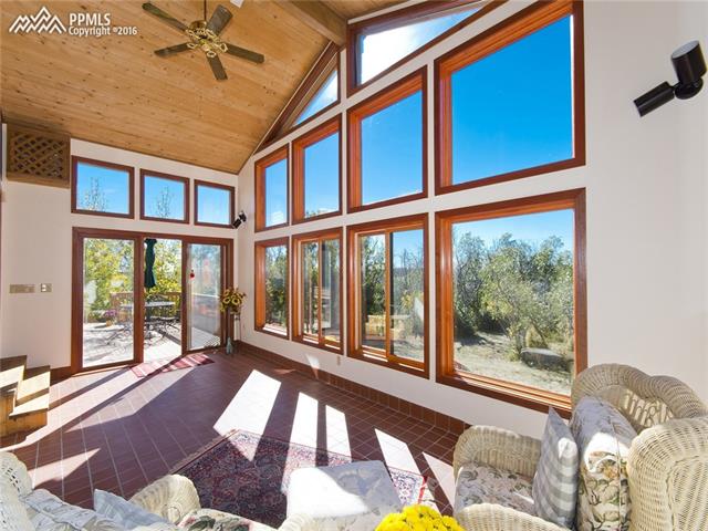 4715 Limestone Road Monument, CO 80132 - Photo 14 of 36 Spacious Sun Room opens to deck