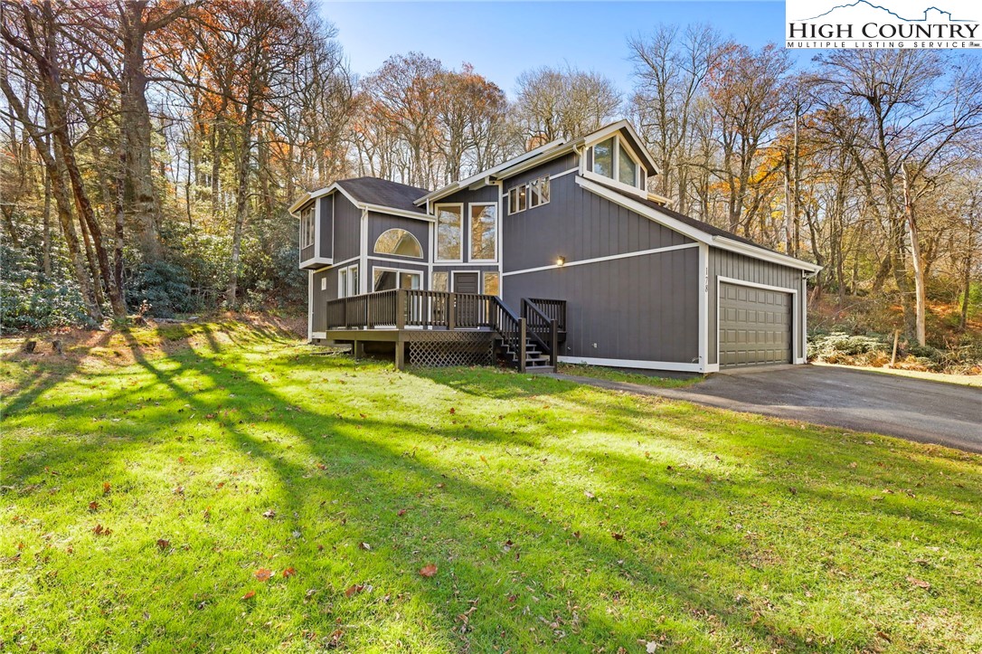 178 Brook Lane Boone, NC 28607 - Photo 42 of 48 a view of a house with a yard