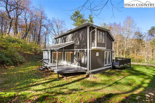 a view of swimming pool with a yard