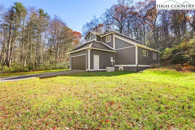 a view of swimming pool with a patio