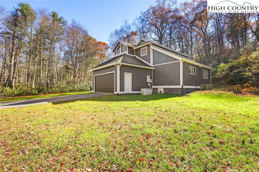 178 Brook Lane Boone, NC 28607 - Photo 44 of 48 a front view of house with yard and green space