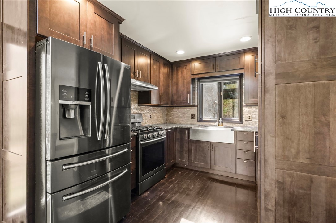 178 Brook Lane Boone, NC 28607 - Photo 5 of 48 a kitchen with stainless steel appliances granite countertop a refrigerator and a stove