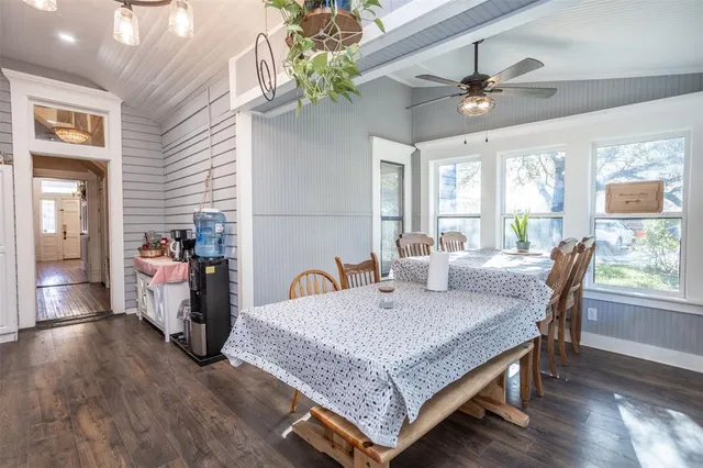 a bedroom with a bed and a book shelf