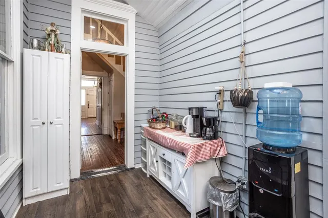 a bed room with furniture and a window
