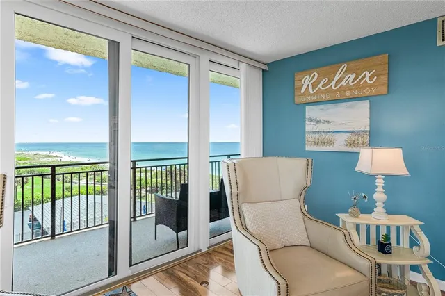 a bedroom with a bed and a furniture