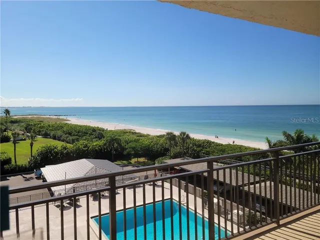 a balcony with an ocean view
