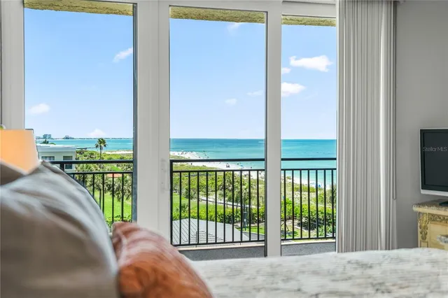 a living room with large windows