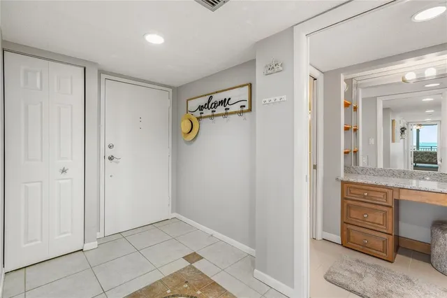 a view of a balcony with wooden floor and city view