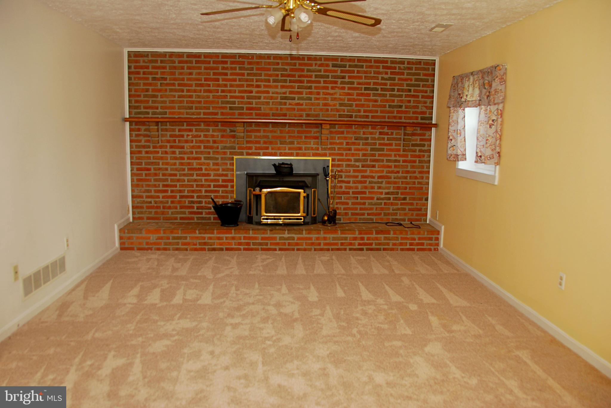 75 Roop Road Rising Sun, MD 21911 - Photo 18 of 30 Great room complete with woodstove
