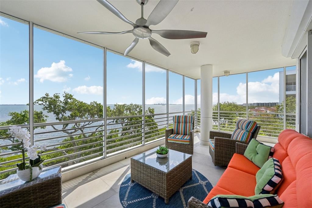 2450 Harbourside Drive, Unit 244 Longboat Key, FL 34228 - Photo 27 of 46 a view of a living room with furniture and a floor to ceiling window