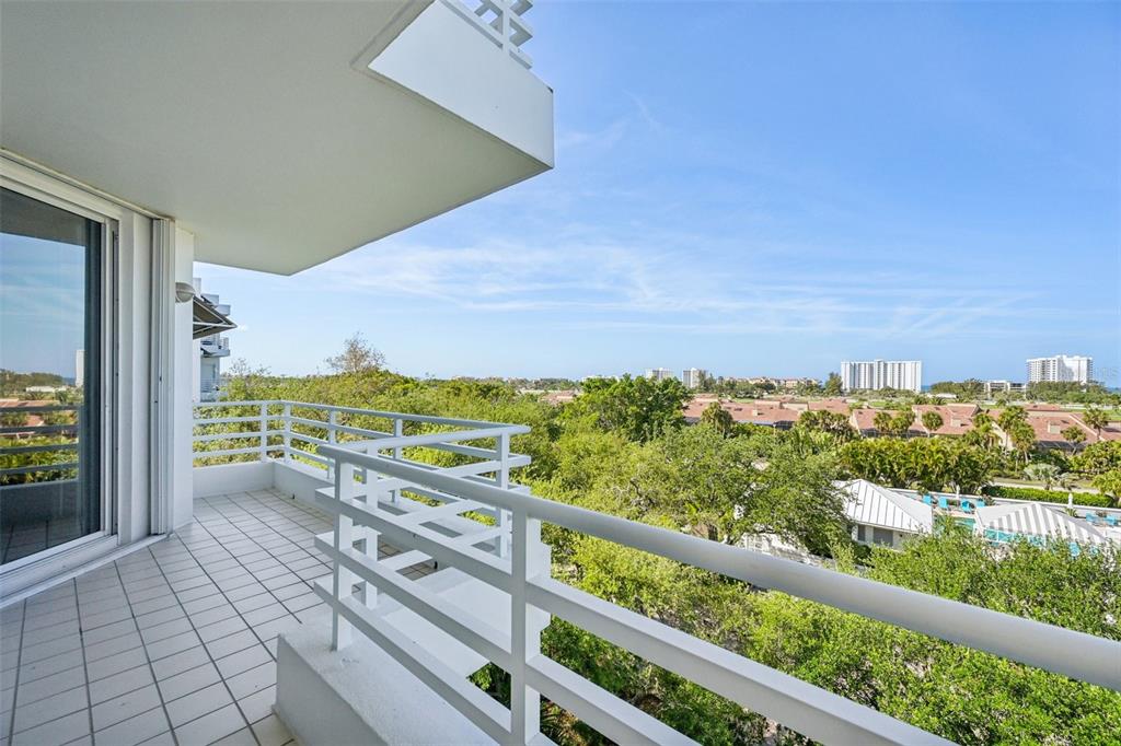 2450 Harbourside Drive, Unit 244 Longboat Key, FL 34228 - Photo 29 of 46 a view of a balcony with an outdoor space