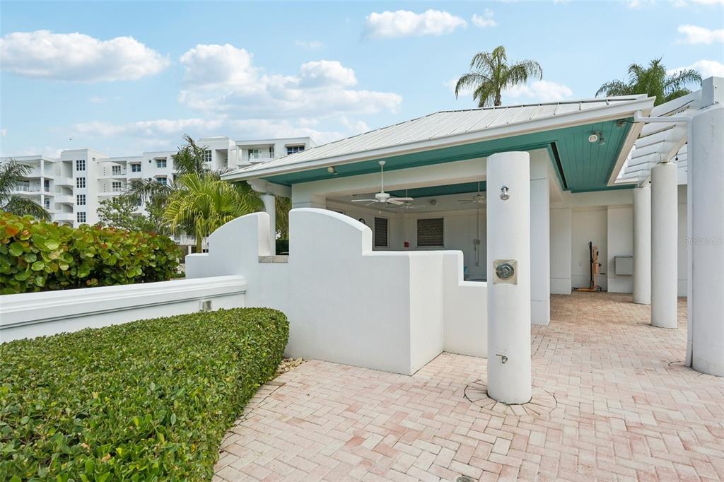 2450 Harbourside Drive, Unit 244 Longboat Key, FL 34228 - Photo 38 of 46 a view of a back yard with a patio
