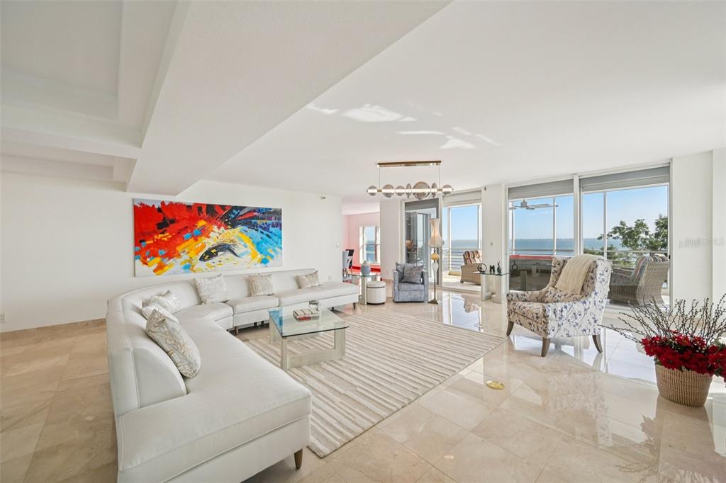 2450 Harbourside Drive, Unit 244 Longboat Key, FL 34228 - Photo 5 of 46 a living room with furniture and a couch