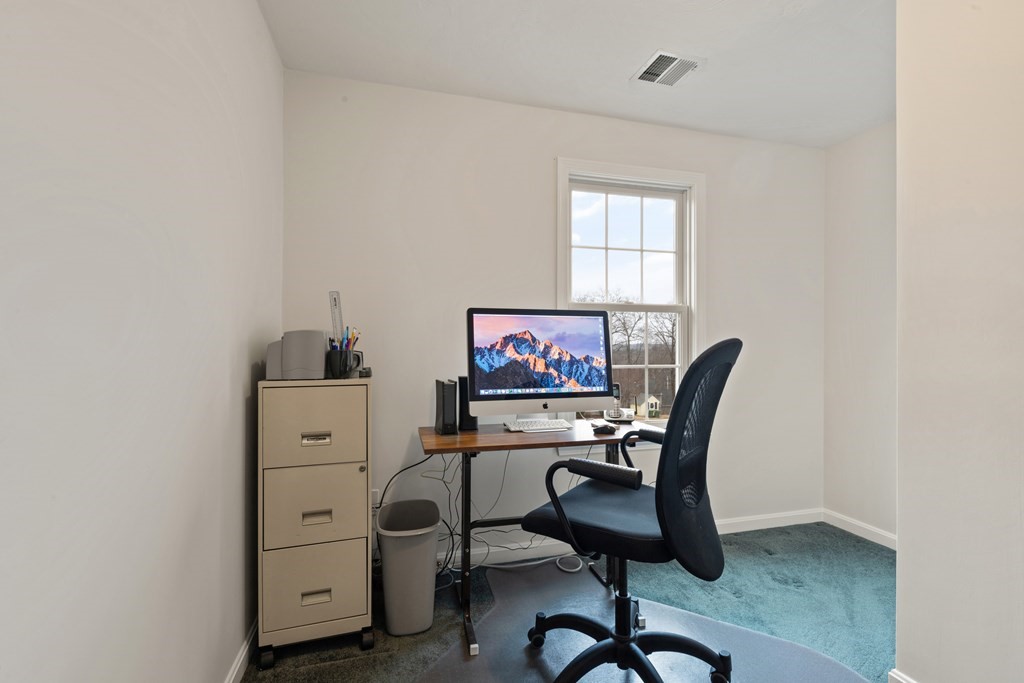 246 Morgan Road Whitinsville, MA 01588 - Photo 20 of 28 a view of a workspace with furniture and a window