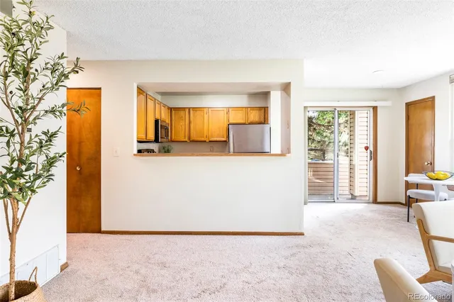 a view of livingroom with furniture and window