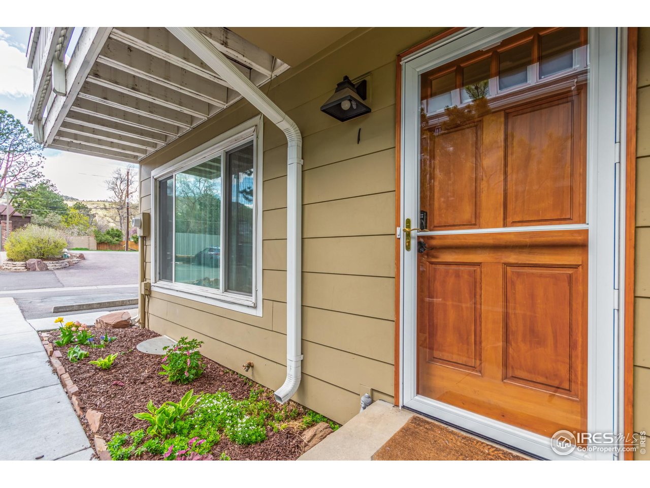a view of entrance gate of the house