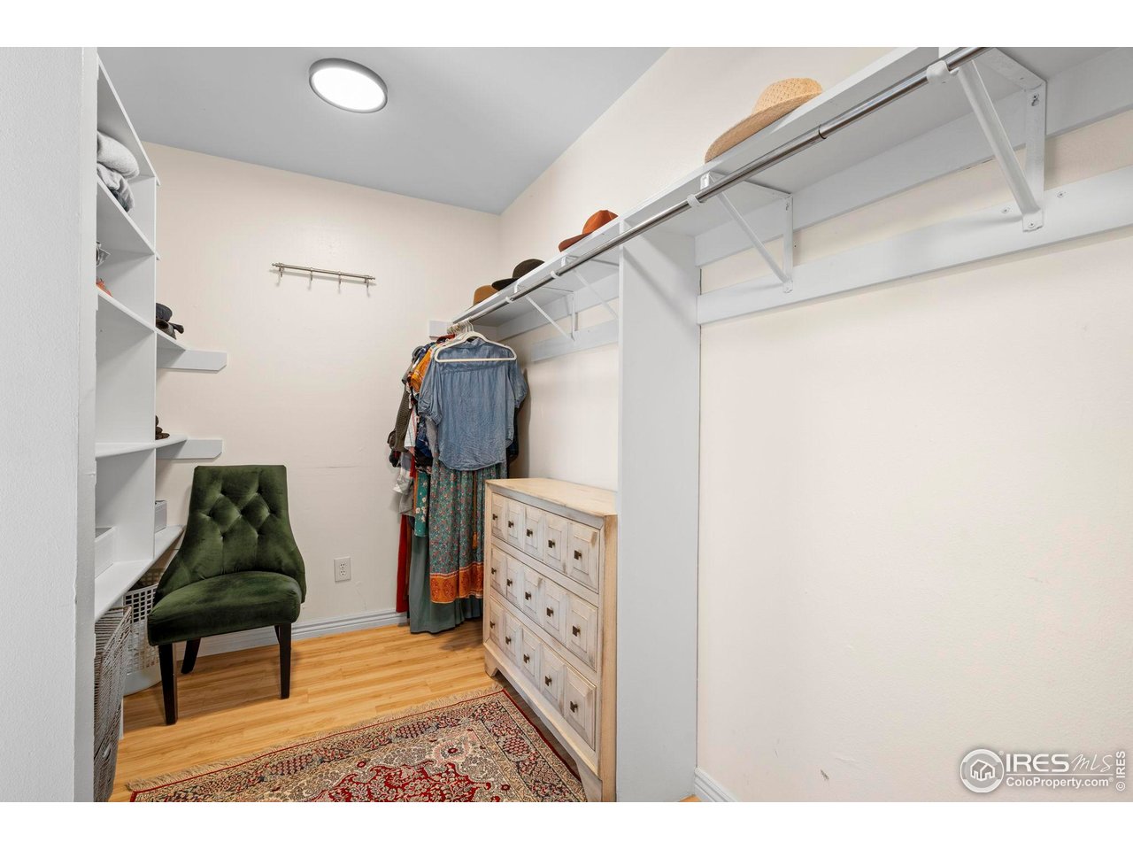 3878 Broadway, Unit 1 Boulder, CO 80304 - Photo 15 of 36 a view of walk in closet with clothes and shoes
