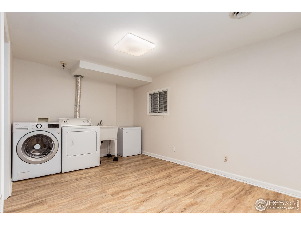 3878 Broadway, Unit 1 Boulder, CO 80304 - Photo 24 of 36 a view of a storage & utility room with washer and dryer