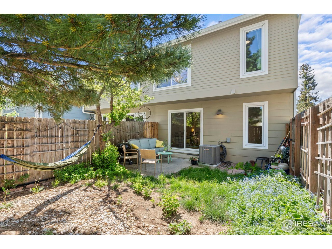 3878 Broadway, Unit 1 Boulder, CO 80304 - Photo 28 of 36 a backyard of a house with seating space