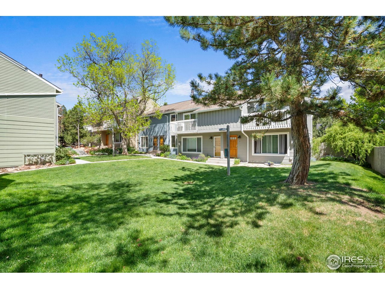 3878 Broadway, Unit 1 Boulder, CO 80304 - Photo 30 of 36 a front view of a house with a garden