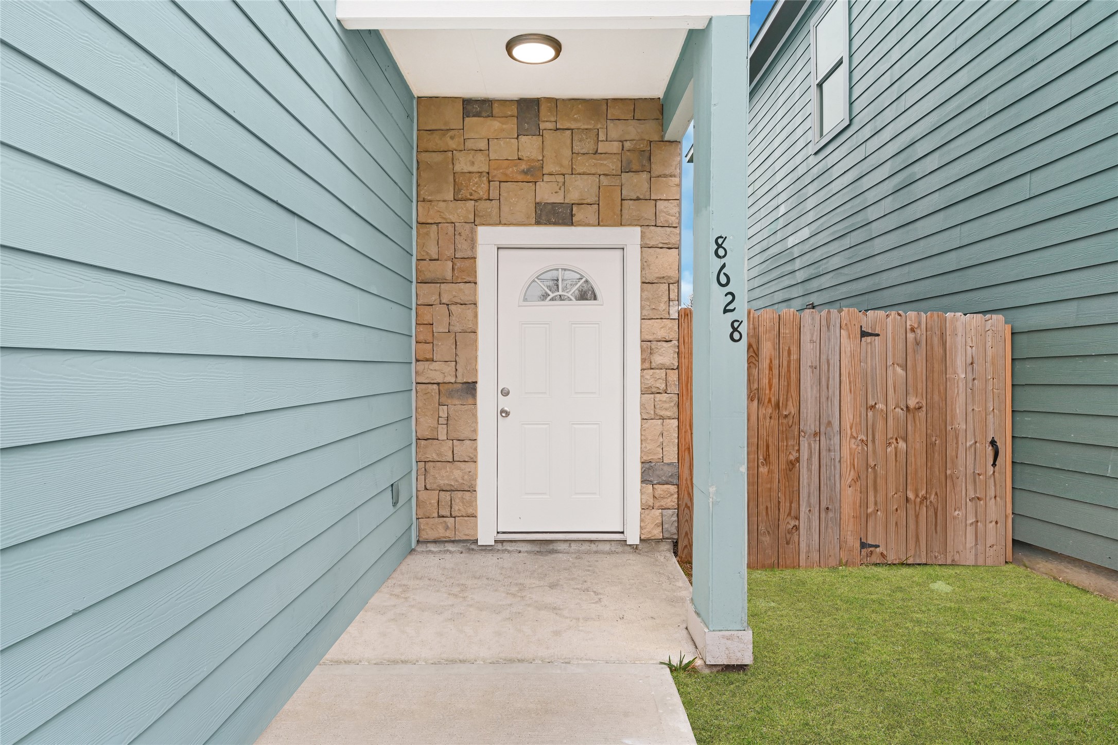 8628 Scott Street Houston, TX 77051 - Photo 2 of 22 a view of a wooden door of the house