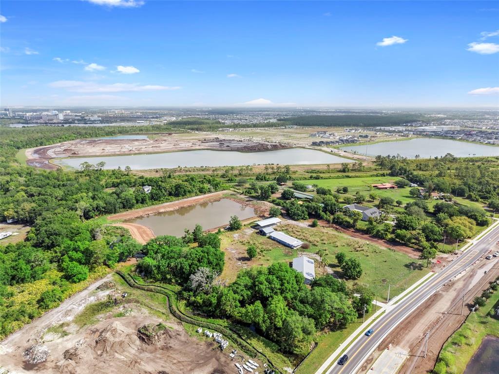 4385 Boggy Creek Road Kissimmee, FL 34744 - Photo 8 of 23 an aerial view of a city