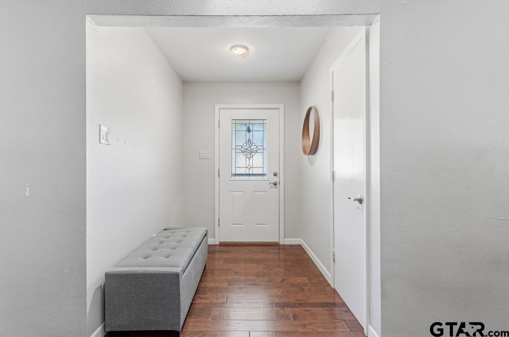 1302 Lake Cross Road Hideaway, TX 75771 - Photo 11 of 31 a view of room with window and wooden floor