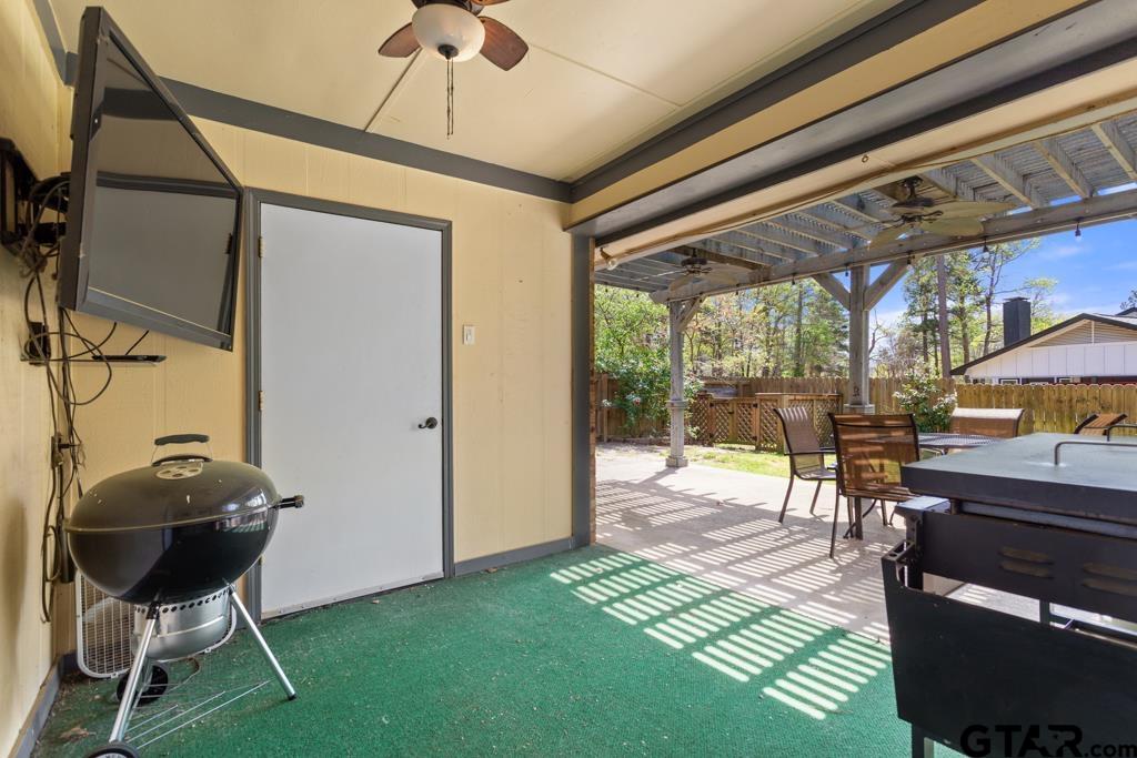 1302 Lake Cross Road Hideaway, TX 75771 - Photo 19 of 31 a room with furniture and a window