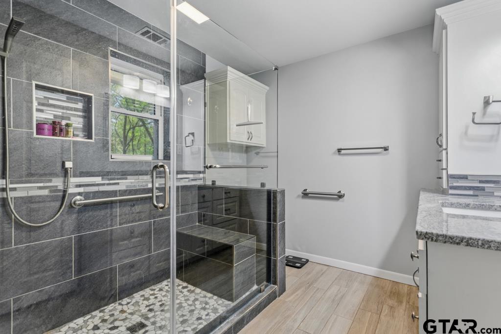 1302 Lake Cross Road Hideaway, TX 75771 - Photo 6 of 31 a bathroom with a shower