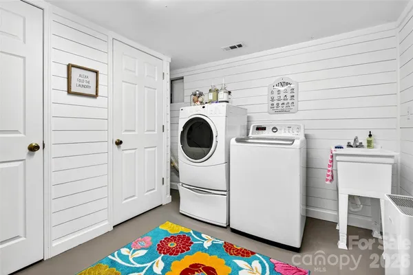 a utility room with dryer and washer